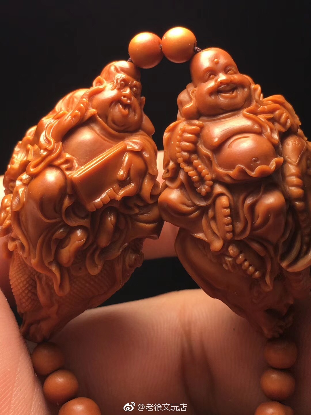 橄榄核雕骑兽单面十八罗汉2340作品特点刀工细腻干净