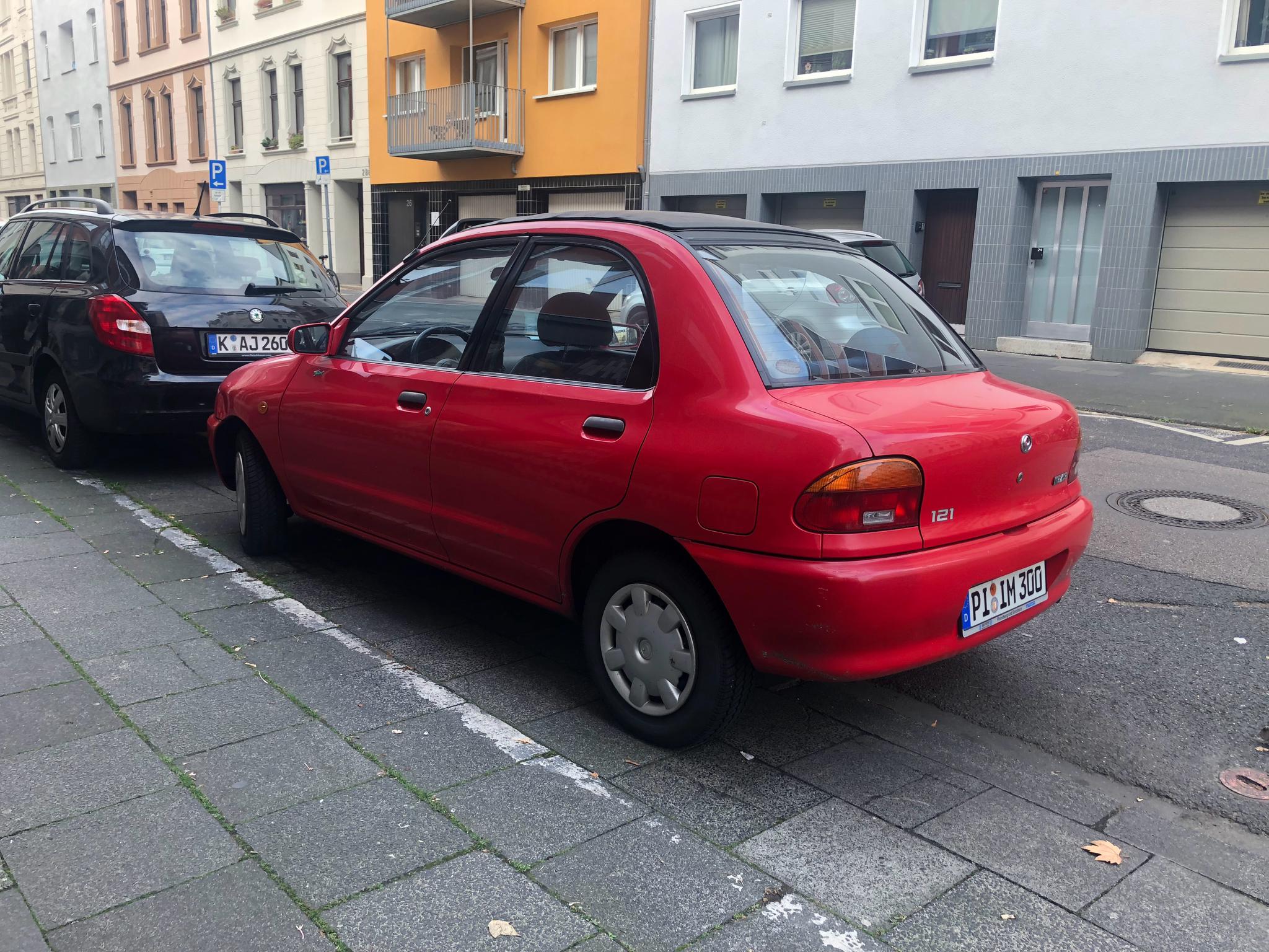 马自达还有个121呢,长得像不像当年起亚千里马的短胖版-新浪汽车