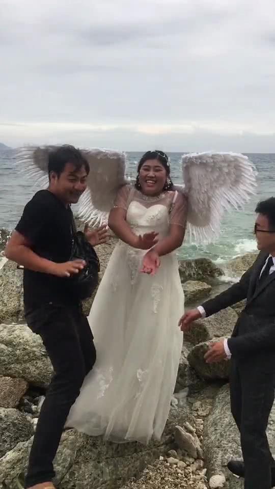 胖新娘10万元拍婚纱照扮天使,原片辣眼睛,精修图仙气飘飘