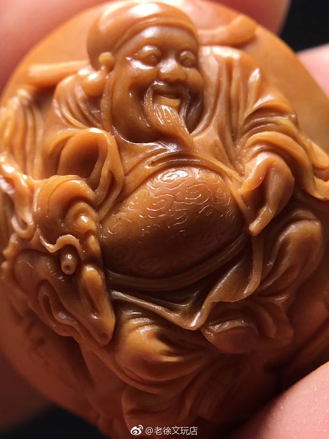 橄榄核雕九子骑兽财神242527正面财神雕工干净利落