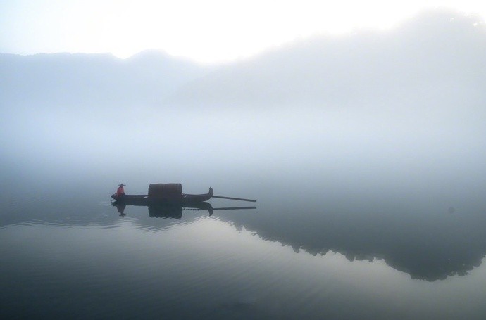 悠然撒鱼网,何关日归西
