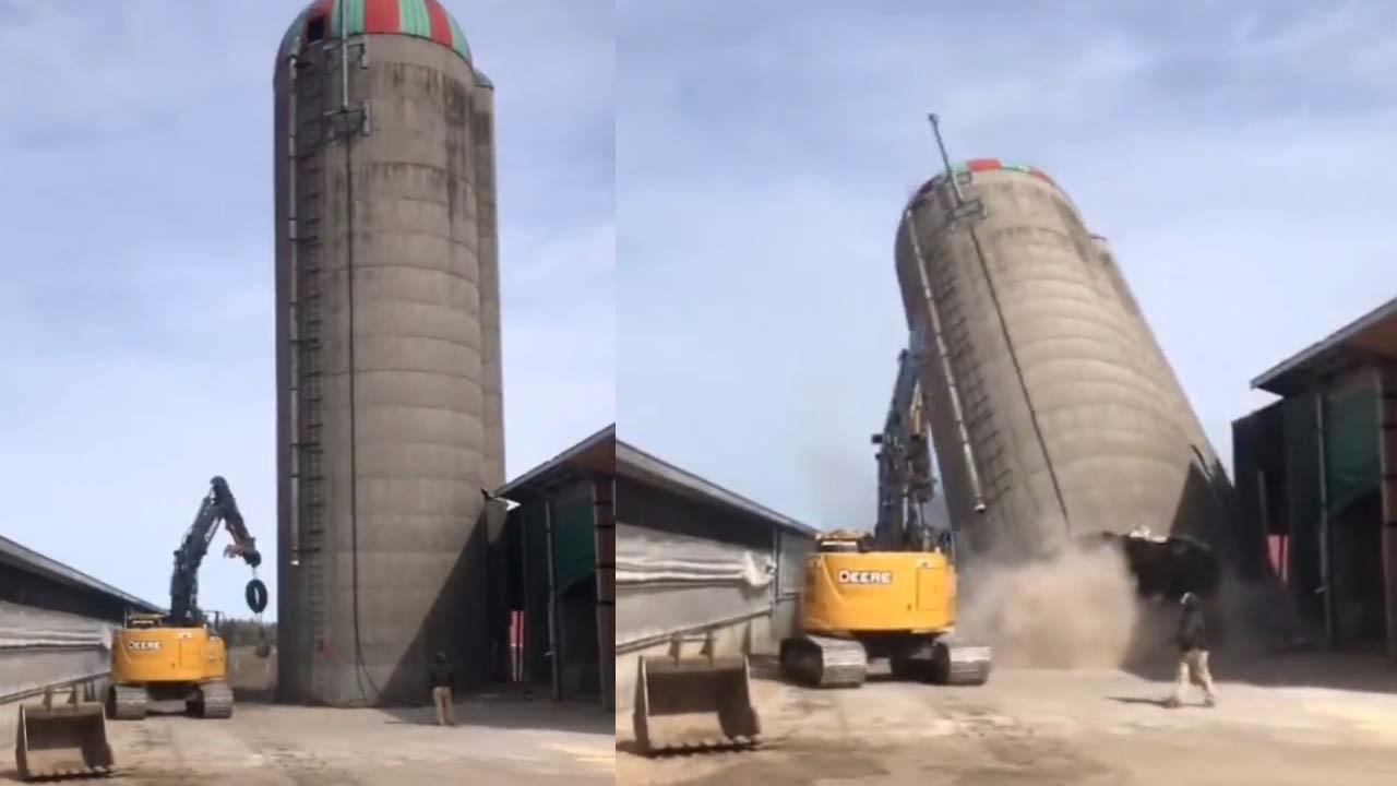 司机巧用悬吊铁球 拆塔不费吹灰之力