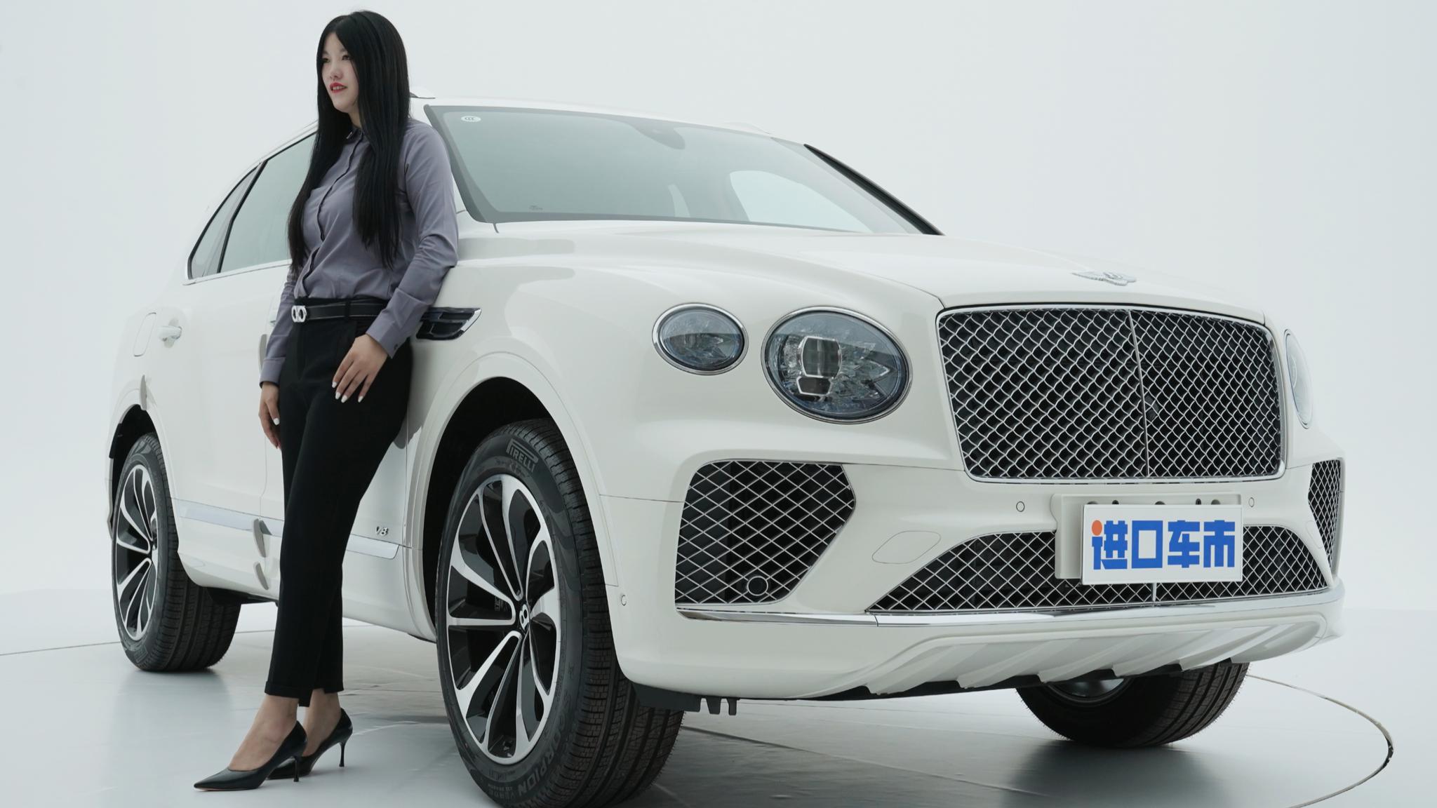 为您推荐: 宾利的魅力再加上美女渔网丝袜的魅力,你被征服了吗?