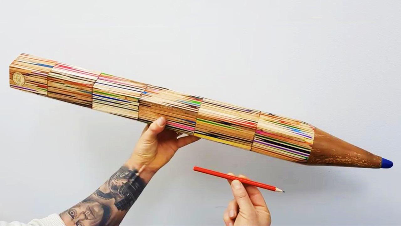 大叔脑洞大开,用1000支小彩铅做成"超大铅笔",还能用来写字!