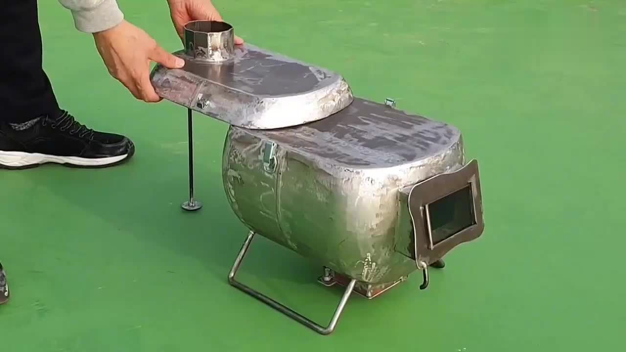 用废弃的煤气罐改造火炉真是天才发明非专业人士请勿模仿