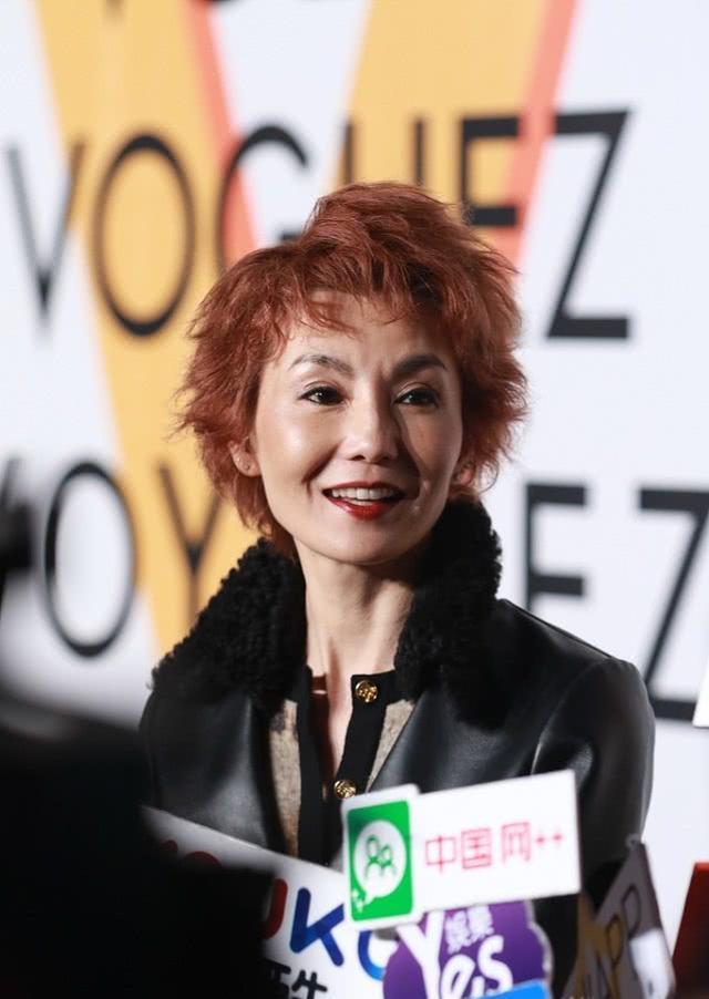 求张曼玉还是把头发留长吧看着难驾驭也就她的气质能尝试了