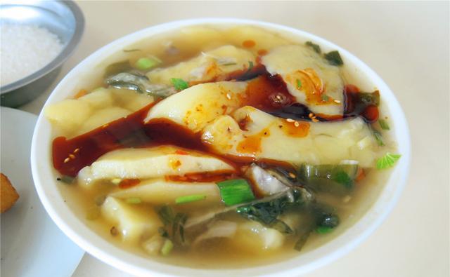 阿坝汶川羌家美食洋芋糍粑羌族饮食文化的一朵奇葩