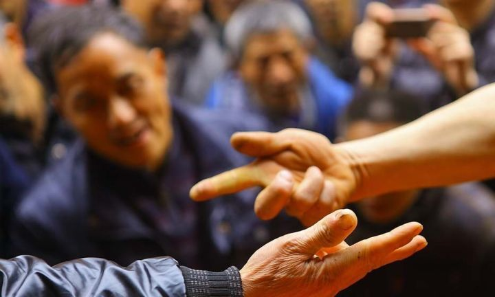 猜码是广西酒桌文化的重要组成部分,这种现象对广西有怎样的影响