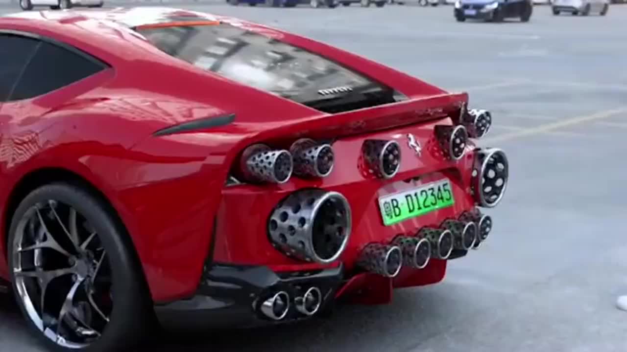 这肯定是二手车贩子的跑车,竟然装了这么多排气管