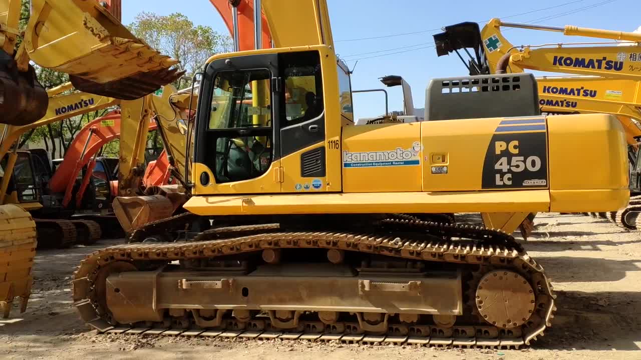 看一台大家伙二手小松450大型挖掘机上车都费劲