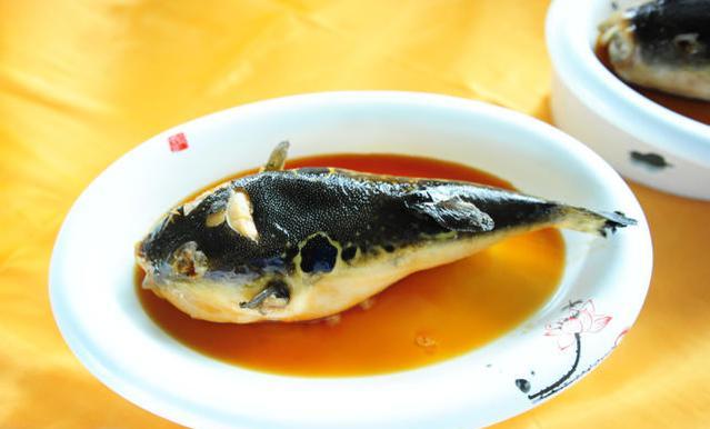 日本人爱吃河豚<a href=