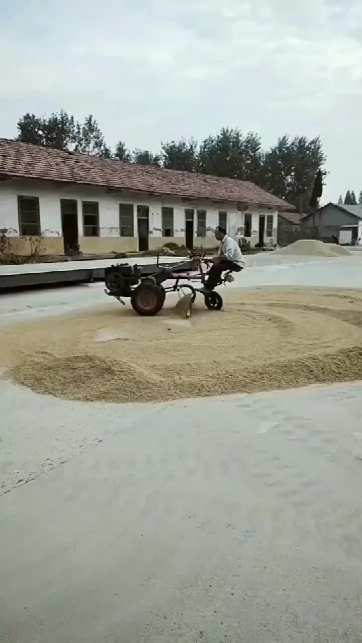 农民大哥发明的晒粮神器高效省力又好用实在太有才了