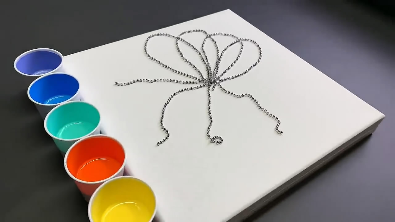 手工绘画作品,带你学习如何用拉绳画花朵!