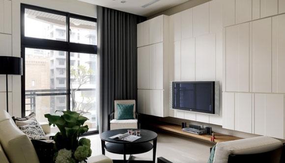简约风格两房装修虽不时尚却很温馨，电视墙装柜子真实用！