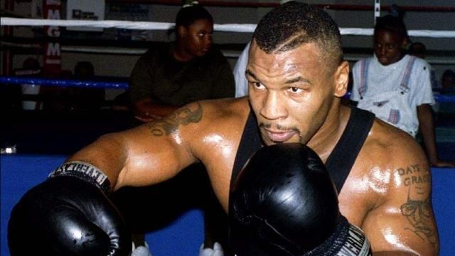 泰森打得过ufc选手吗?