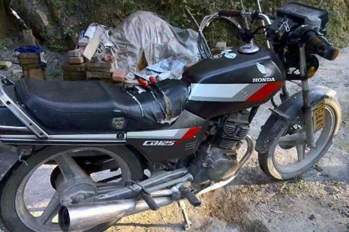 它叫本田王125有两个缸当时价值两套房如今就值几百大洋