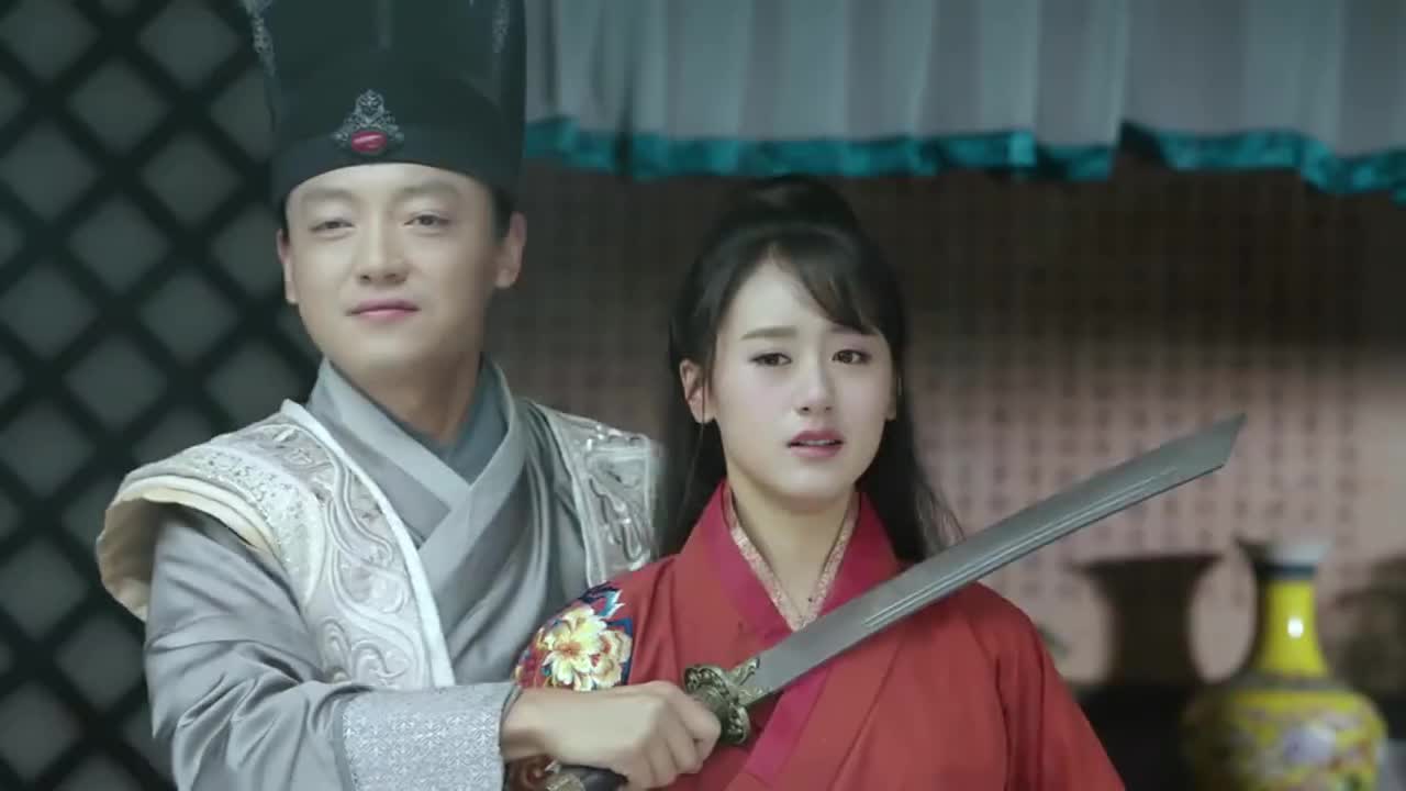 杨凌传:范亭用剑挟持着幼娘,幼娘却劝杨凌不要做傻事