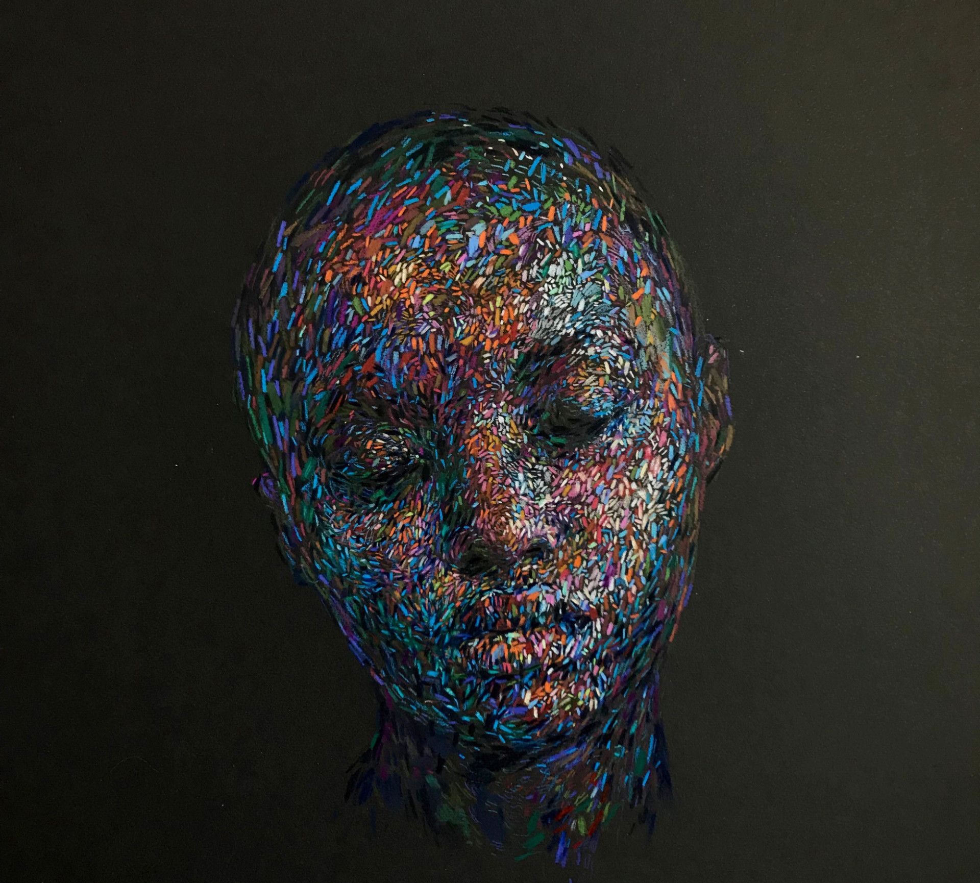 特殊的肖像画,仔细看,其实是由无数个小色块拼合而成