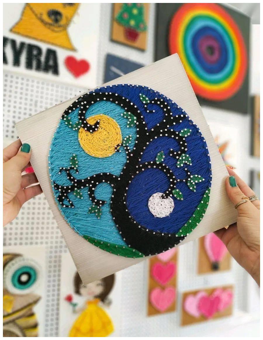 剩余的绣线绕在钉子上让家里留白的墙美得让人陶醉附教程