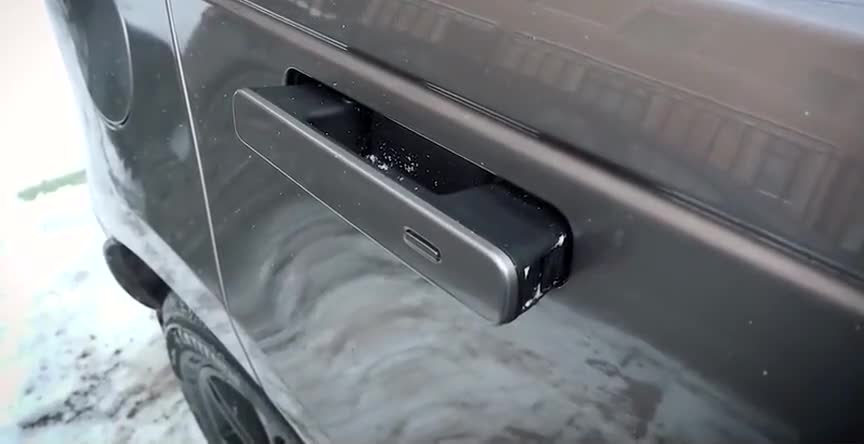 路虎星脉的伸缩门把手被冻住后按下钥匙你猜怎样