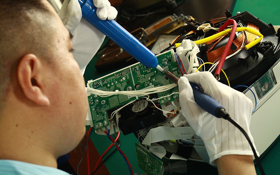 王师傅日本电饭煲维修场景