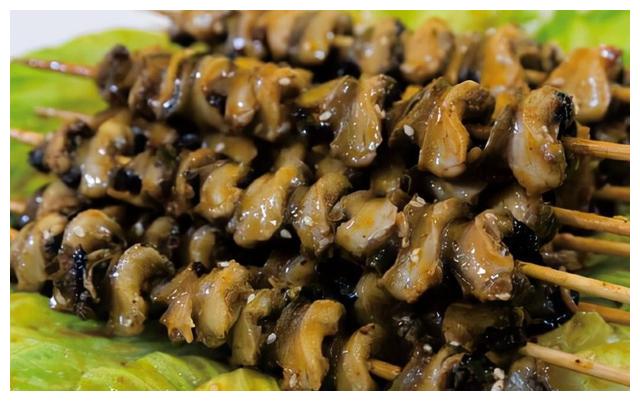 烤田螺在广西,烧烤摊也少不了田螺的踪影.