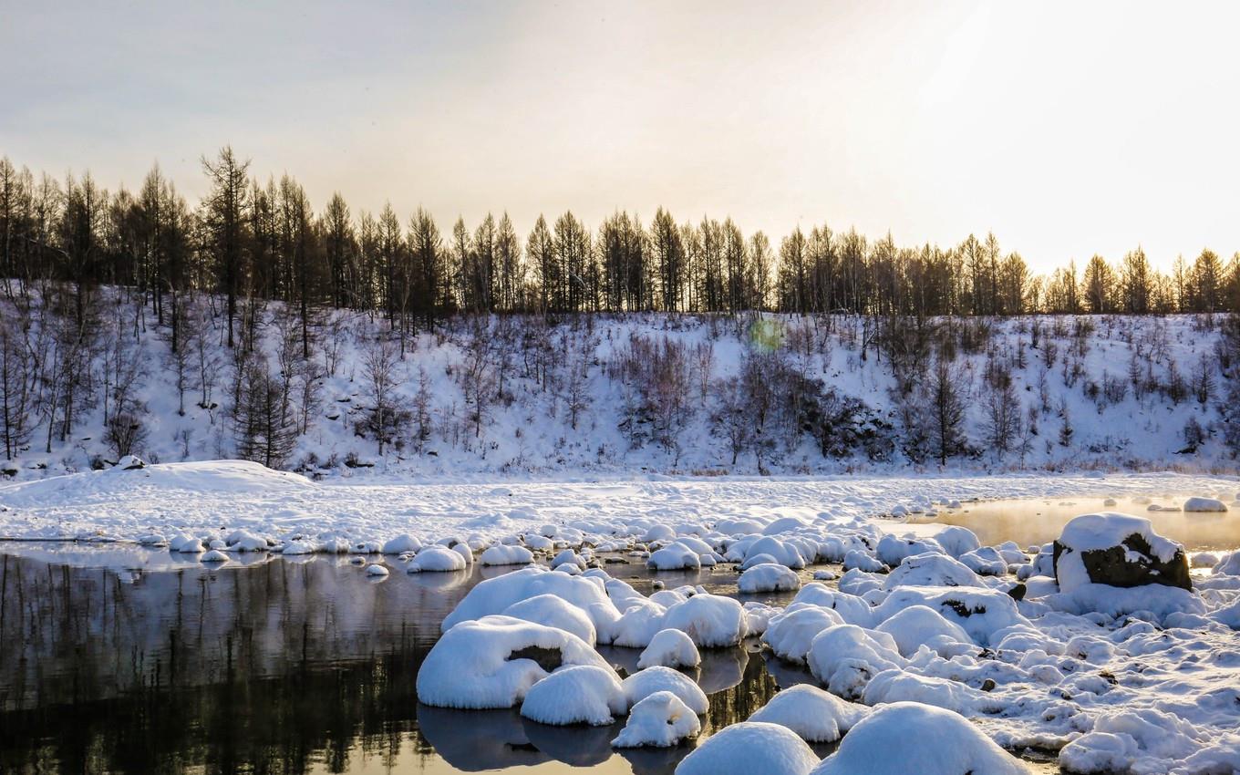 这里被誉为"中国瑞士",雪景美如画,有条河零下30℃也不结冰