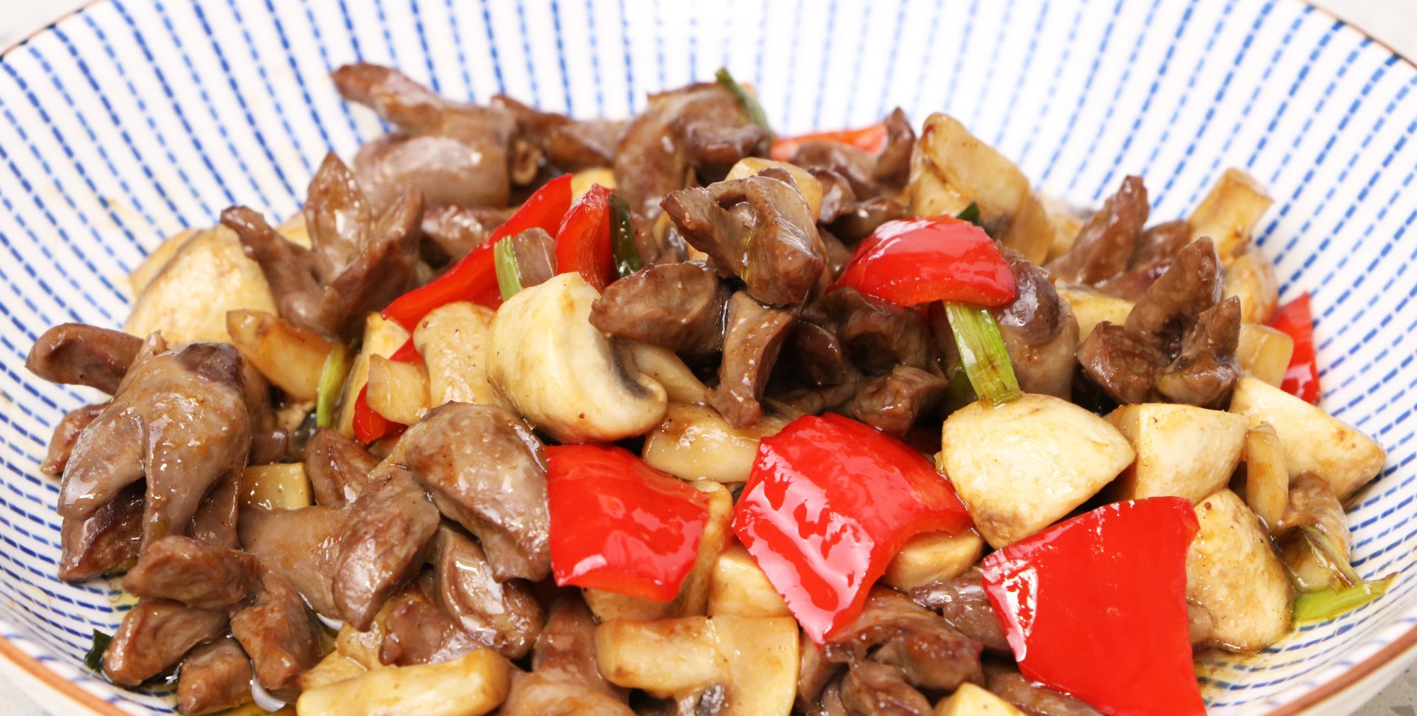 口蘑炒鸡心的家常做法_高清图集_新浪网