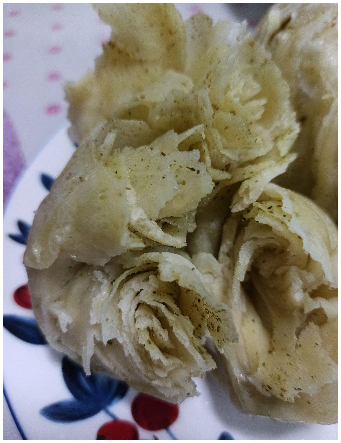 油塔子的做法欢腾解释_96058 2020-07-24 20:44:24       3,边拽边卷