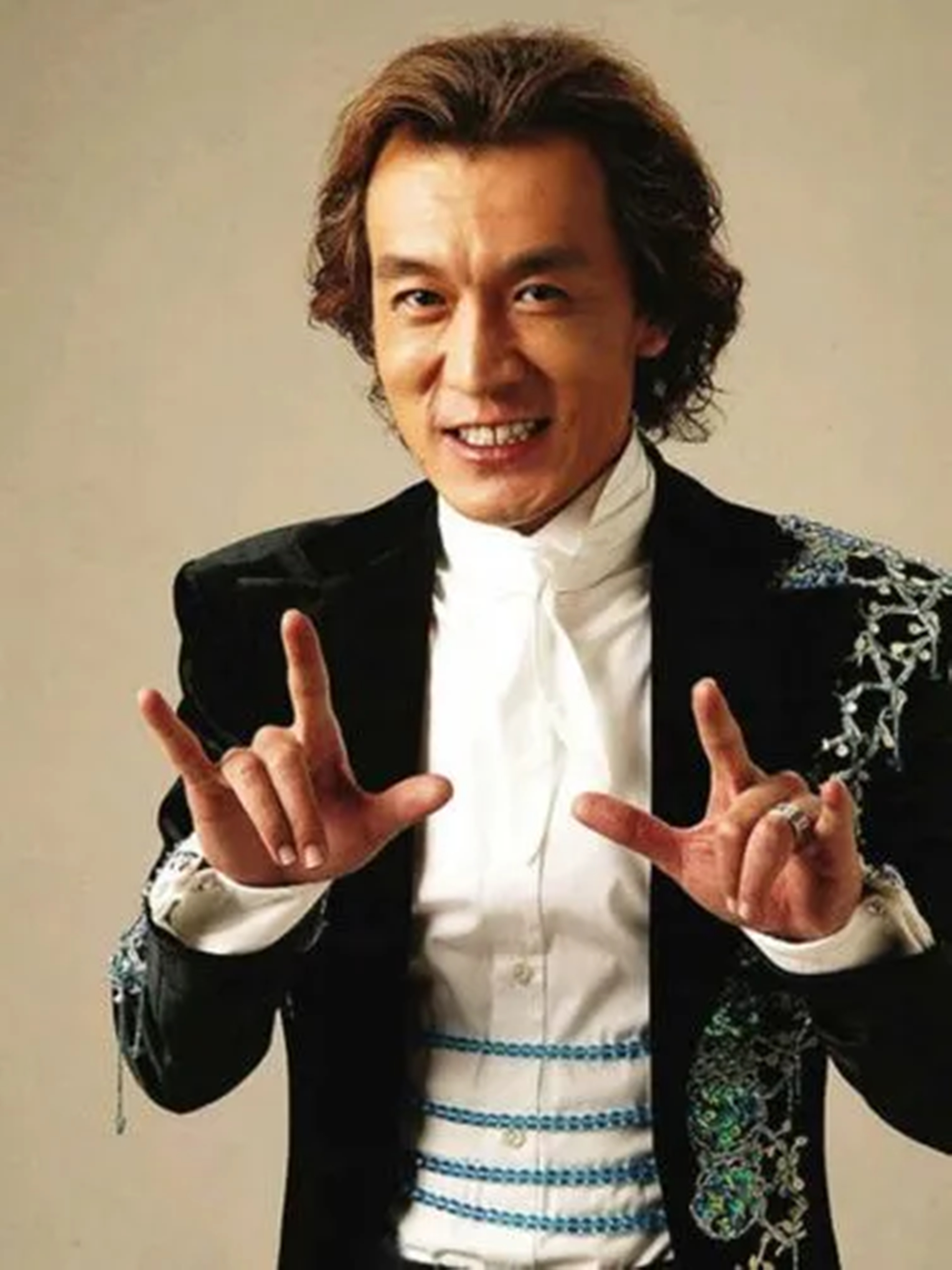 李咏曾经也是央视力捧的主持人,他主持的《幸运52》是当时国内益智类