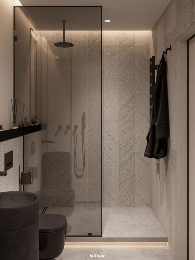 同时一组茶色的极窄边框玻璃隔断,让卫生间实现了干湿分离设计,也更