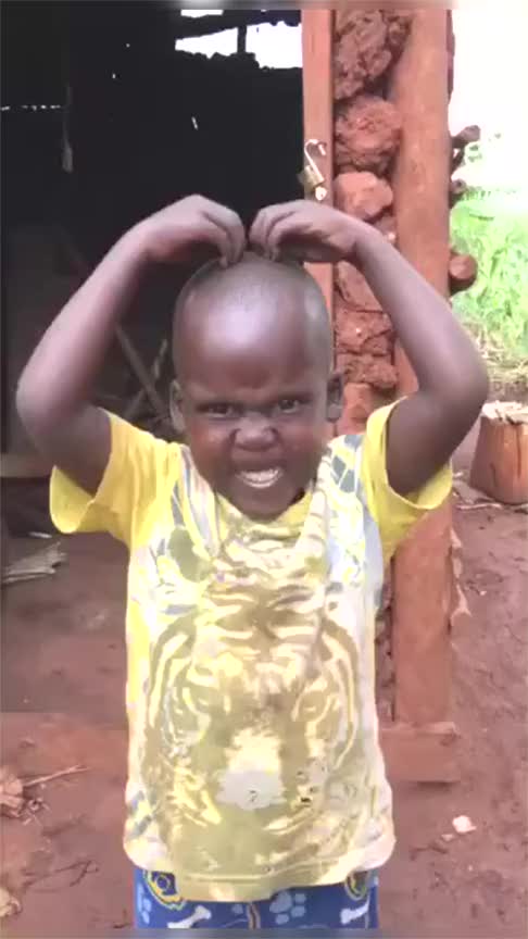 非洲小孩嘎哈呢表情图图片