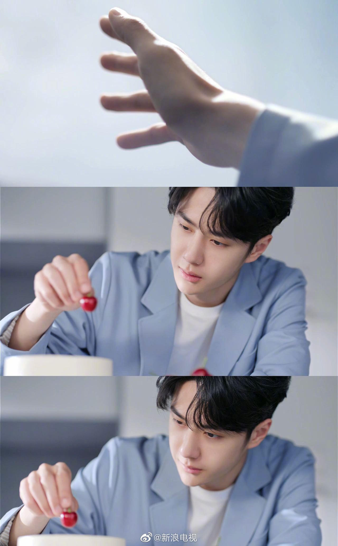 王一博新释出的视频中身穿蓝色休闲西装……__财经头条