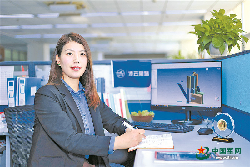 建筑幕墙设计的攻关者陈灿 胡金华摄军嫂陈灿没想到,自己随丈夫从北京