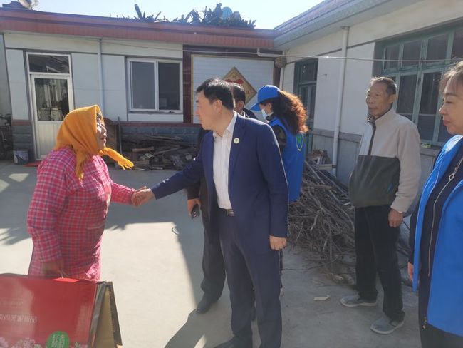 即墨区残联党组书记理事长张新托起残疾人稳稳的幸福让残缺的生命绽放