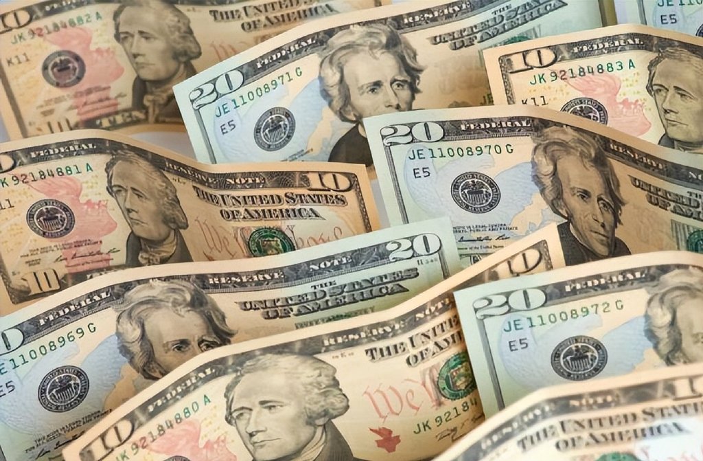 乐观的数据推动亚洲股市上涨，美联储鹰派推高美元