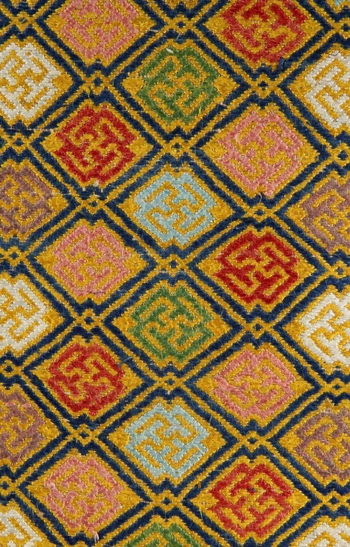 壮族织锦,又称"绒花被",起源于汉代