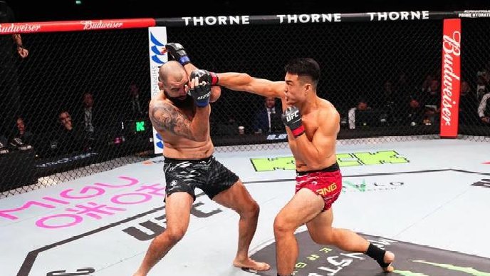 UFC澳门主赛首场,张名扬首回合迎击肘TKO奥兹-迪亚兹,获得UFC两连胜_新浪新闻