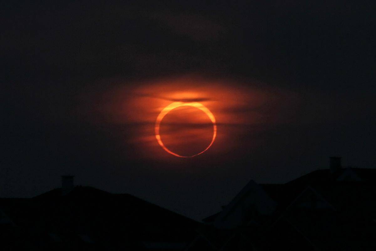 回顾2019年最后一次日食照片图集全球多地观测到火环日食