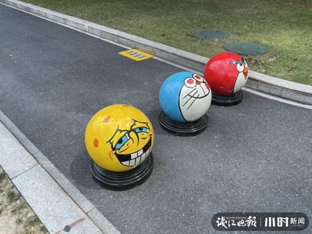 杭州街头的隔离墩都会卖萌了?叮当猫、皮卡丘、愤怒的小鸟……原来是他们画的休闲区蓝鸢梦想 - Www.slyday.coM 杭州街头的隔离墩都会卖萌了?叮当猫、皮卡丘、愤怒的小鸟……原来是他们画的休闲区蓝鸢梦想 - Www.slyday.coM