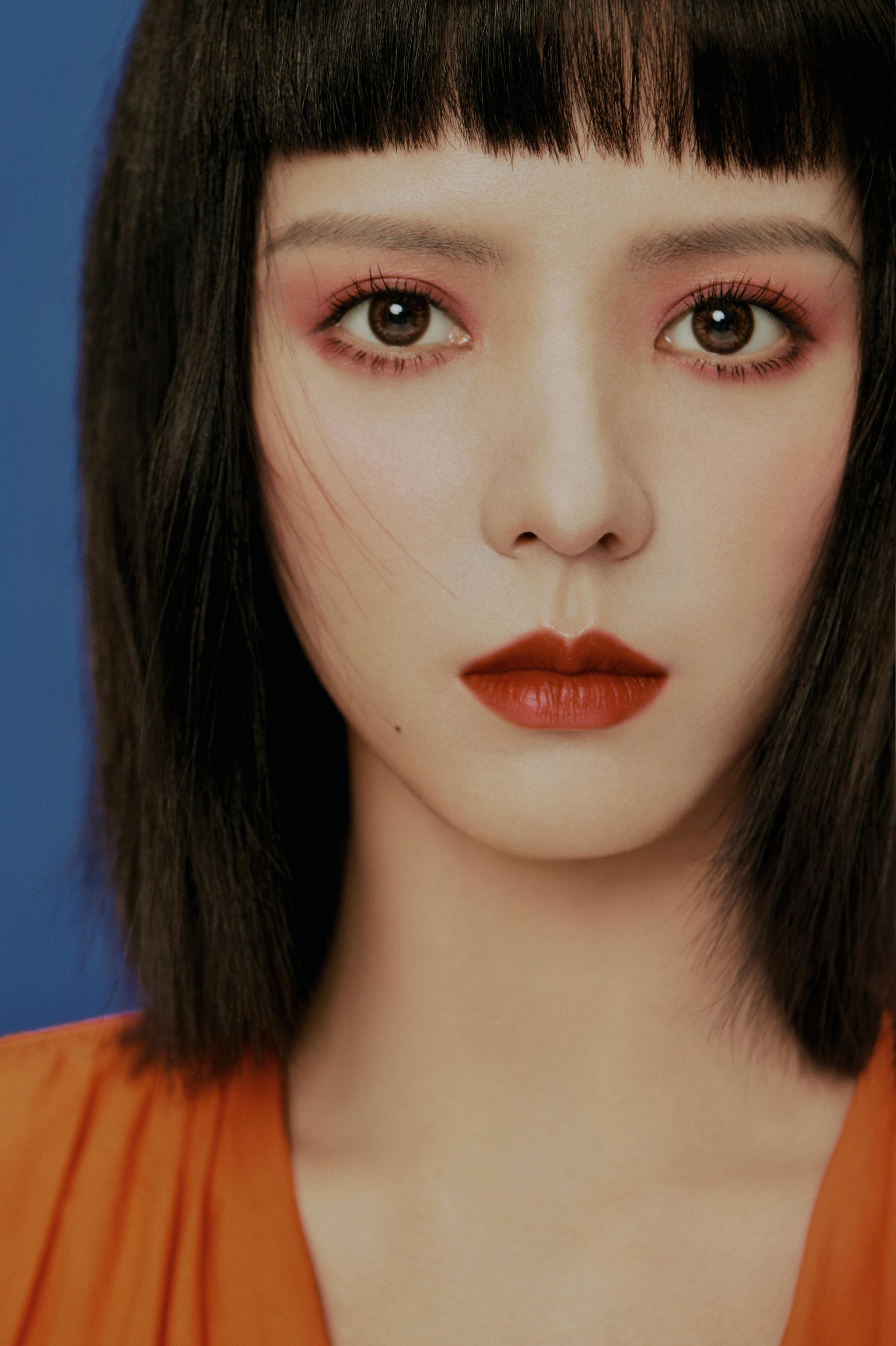 元气少女张予曦绿洲最新造型曝光一身亮橙搭配橘色元气妆容