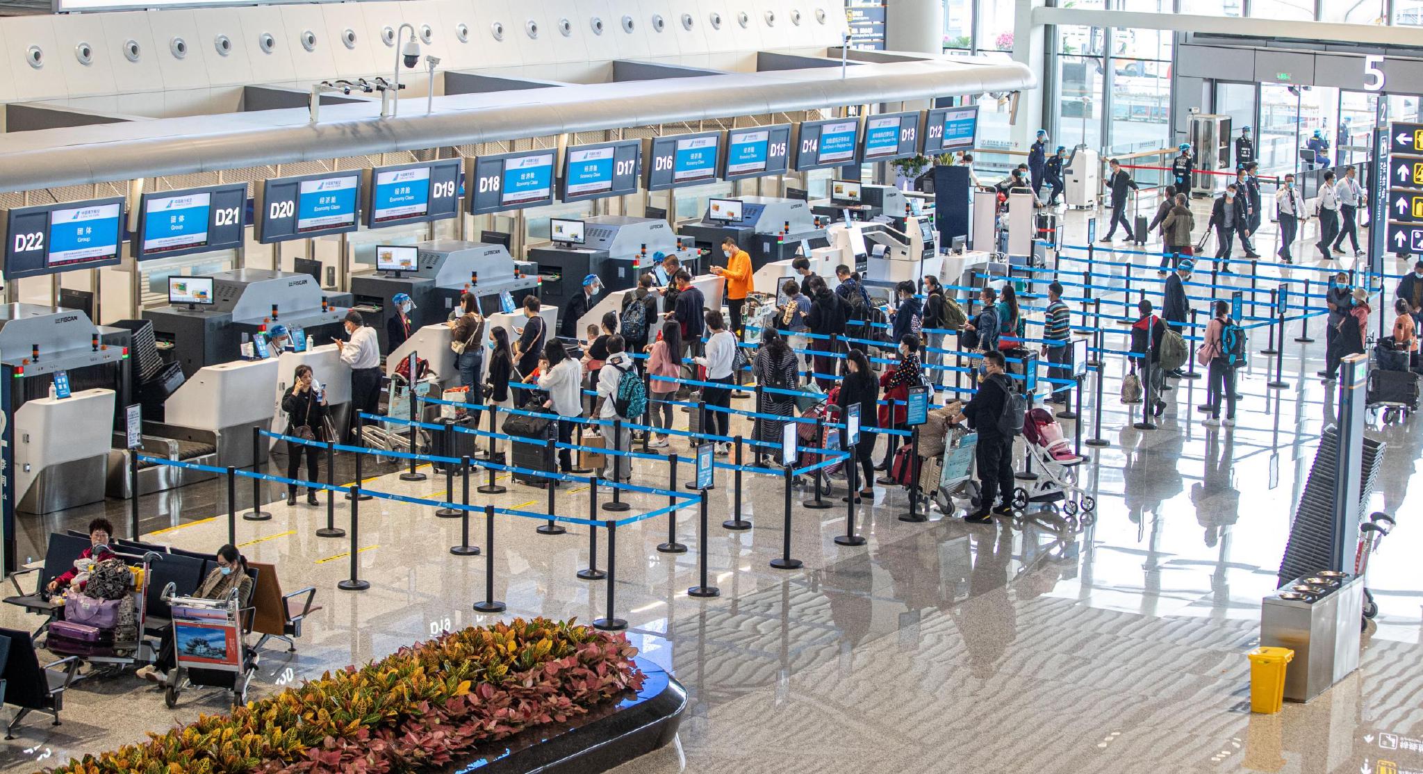 新春走基层春运首日海口美兰机场航班放行正常率978