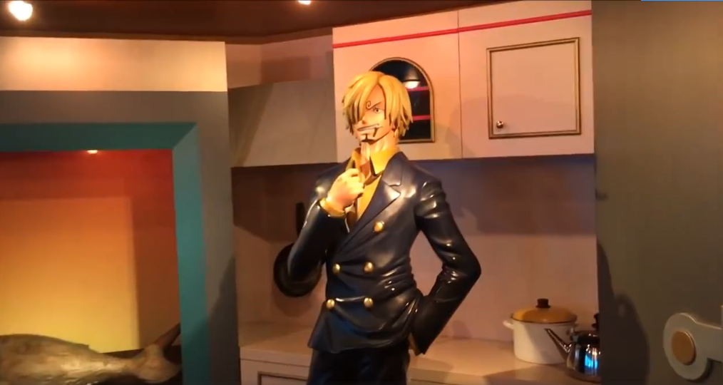 接着,我们来到了山治的厨房,山治点燃香烟,冰箱中的食材正等待着他去