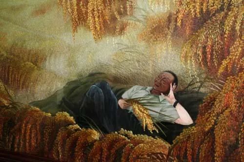 袁公累了，需要歇歇了，他正在天堂的稻穗下乘凉休闲区蓝鸢梦想 - Www.slyday.coM