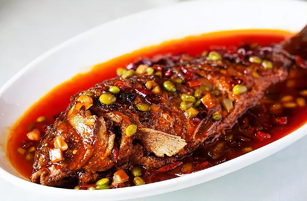 干烧岩鲤是达州市开江县的地方传统名菜,在开江当地