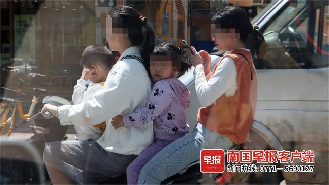 清明假期，南宁交警查处多起电动车违规载人行为休闲区蓝鸢梦想 - Www.slyday.coM