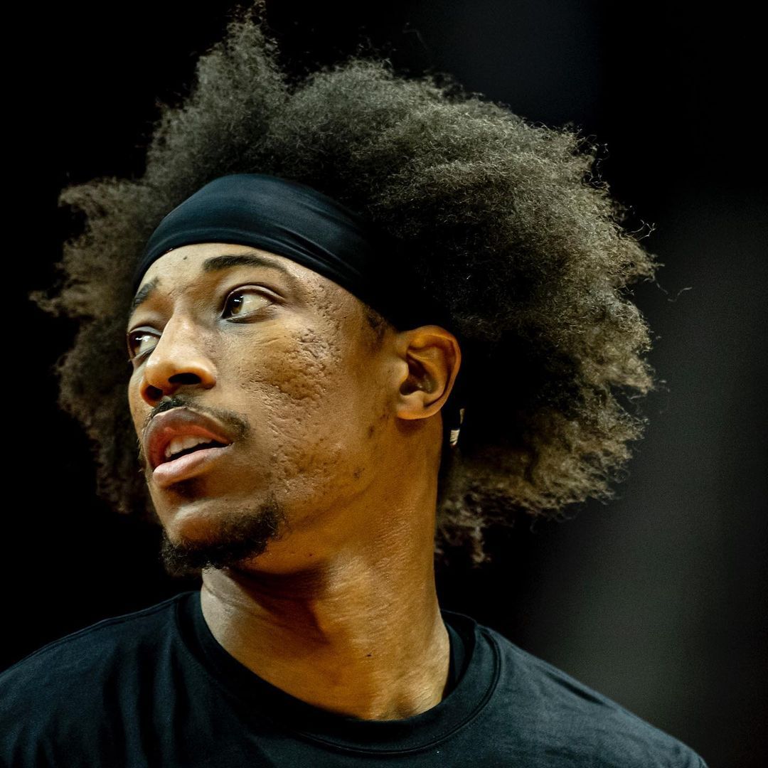 分享几张德罗赞帅图.