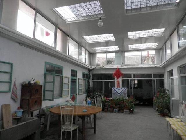 越来越多农村人把露天院子封闭成阳光房农村又一景美观又实用