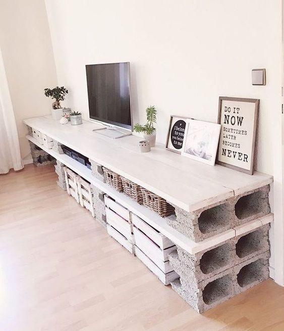 沙发,茶几,电视柜不过相比较而言,我还是比较喜欢空心砖 玻璃的翠配