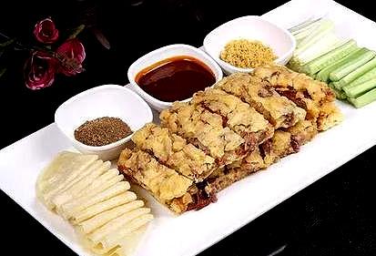 锅烧肘子 色泽金黄 外焦里嫩 干香无汁 肥而不腻